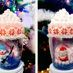 Dwa urocze figurki do kuli śnieżnej: bałwanek z miotłą i elf w czapce Mikołaja, ozdobione świątecznymi wzorami.